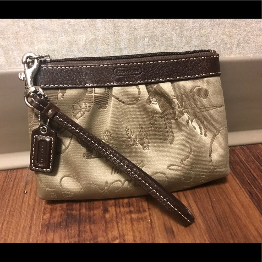 NWOT 100% Authentic Coach wristlet.